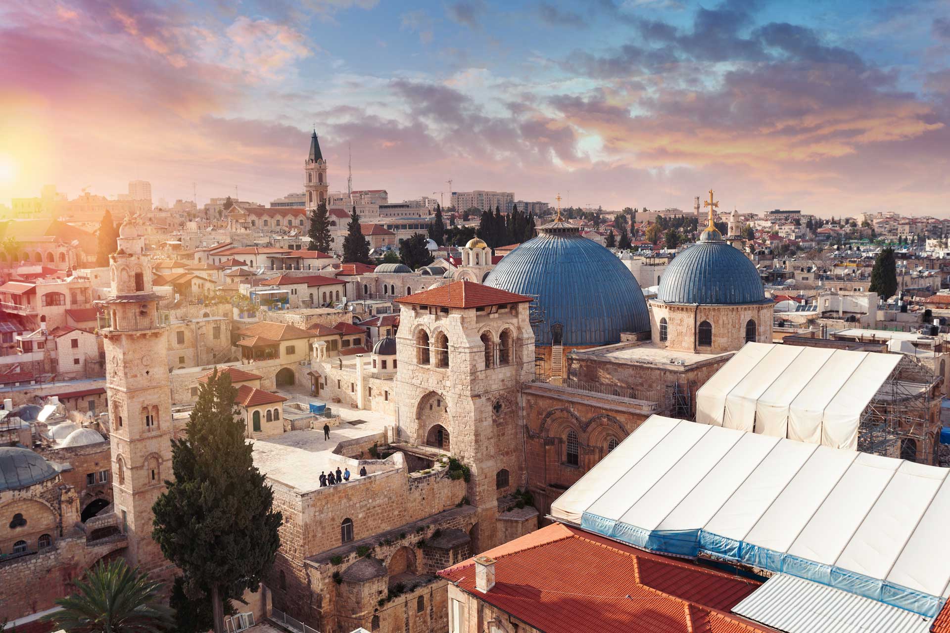 Panoramic aerial view of the Temple of the Holy Sepulcher at sunset in the old city of Jerusalem, Christian quarter, Israel