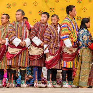 TRIMPHU, BHUTAN - MAR 8, 2017: Unidentified Ngalops people in traditional clothes celebrate some holiday. Ngalops is one of the most populous ethnic groups of Bhutan