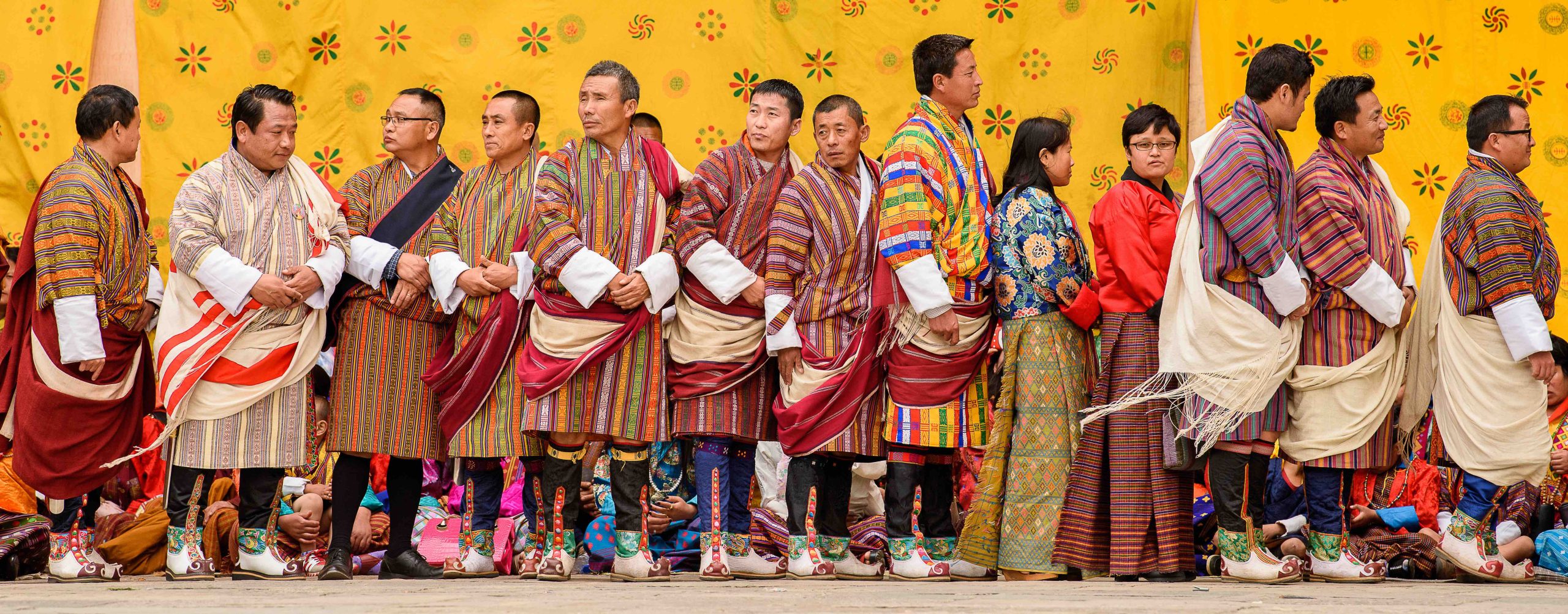 TRIMPHU, BHUTAN - MAR 8, 2017: Unidentified Ngalops people in traditional clothes celebrate some holiday. Ngalops is one of the most populous ethnic groups of Bhutan